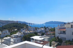 Merkezi lokasyonda, deniz manzaralı ikiz şehir evi