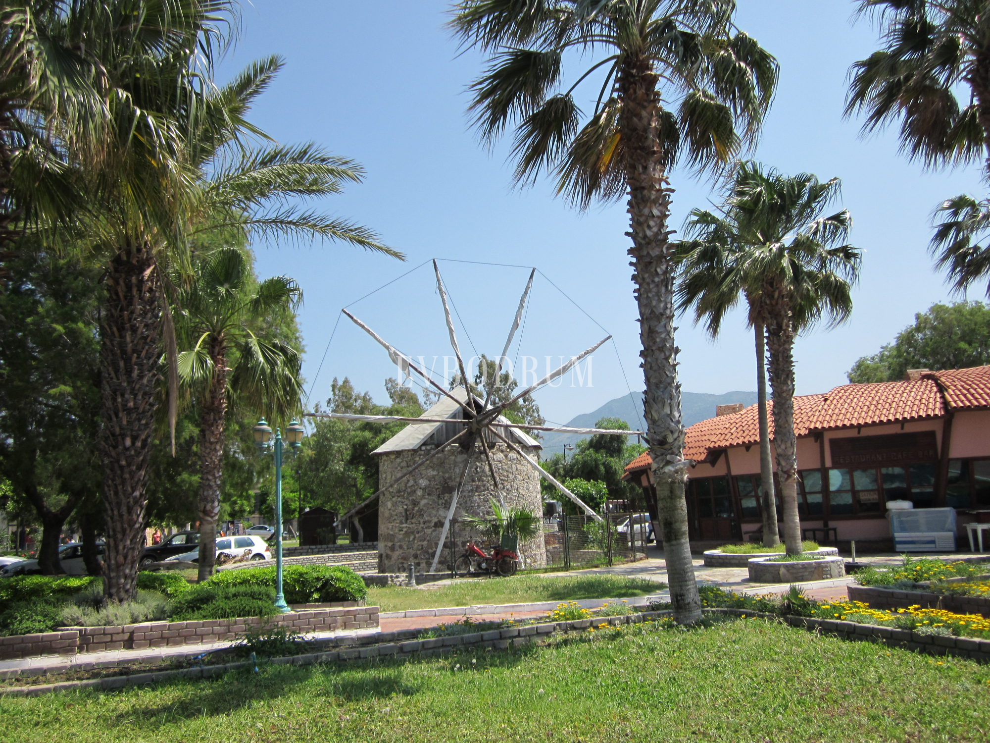 Yalıkavak's emblem: a traditional stone windmill with cloth sails